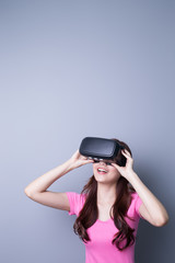 woman using VR headset glasses