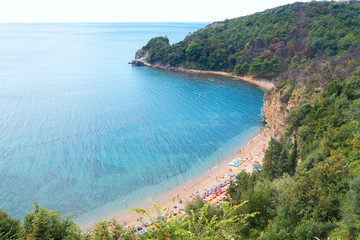 Beach on the Montenegrin coast, the bay in the Adriatic Sea