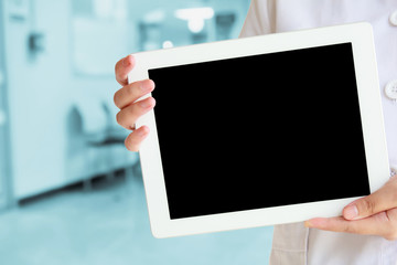 doctor showing tablet computer