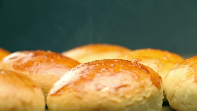 Hot buns for burgers. The hot bread. Fresh pastries.