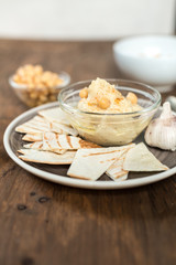 Healthy Homemade Creamy Hummus with Olive Oil and  Chips