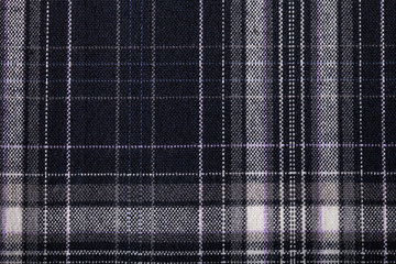 Textured surface of checkered cloth
