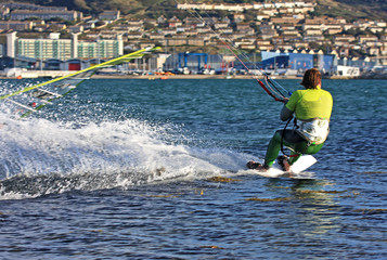 Naklejka premium kitesurfer in Portland Harbour