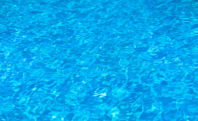 swimming pool with sunny reflections