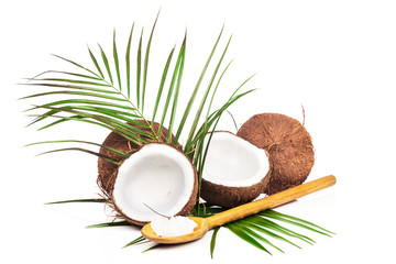 Fototapeta na wymiar Coconuts with green leaves on white background