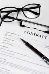 Business contract document with pen