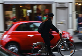 Red fiat 500 car and bicycle in Paris  - obrazy, fototapety, plakaty