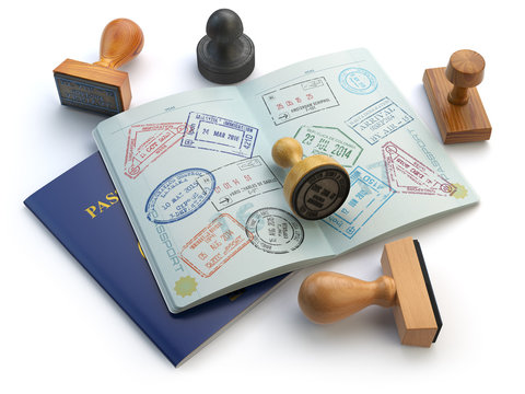 Travel or turism concept. Opened passport with visa stamps and d