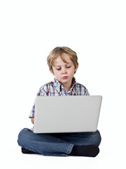 cute boy using laptop.