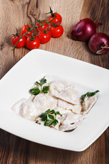 Dumplings with potatoes garnished with Sour Cream and Butter