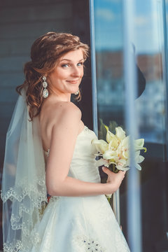 The Bride Near Glass Door