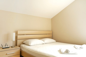 Interior of a bedroom suite in a guest house or an apartment