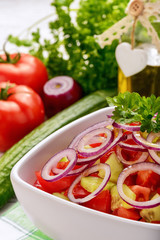 Salad with tomatoes, cucumbers and onion.