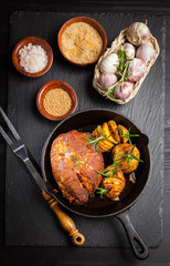 Pulled pork dish with backed rustic potates