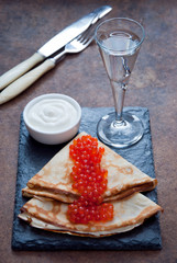 Blini with red caviar  and Vodka