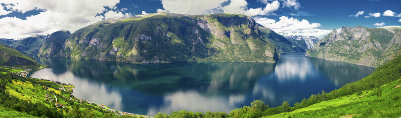 Beautiful panorama with view to Aurland, Aurlandfjord and Sognefjord from Stegastein in Norway, Europe. Sognefjord is largest and second longest fjord in the world.  - obrazy, fototapety, plakaty