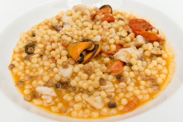 Zuppa di fregola con cozze, muggine e pomodorino infornato, Sardinian Cuisine