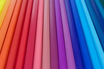 colorful  background - row of color assorted pencils macro