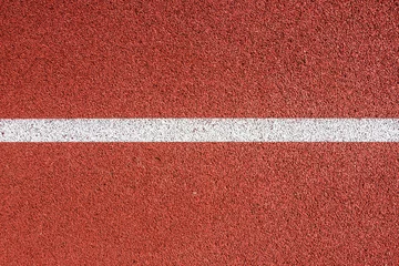 Gordijnen Running track with white line texture. © Paweł Michałowski