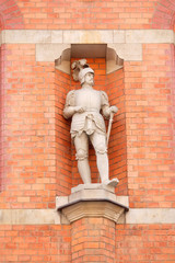 Stockholm, Sweden - April, 4, 2016: monument of a knight on a wall of an ancient house in...