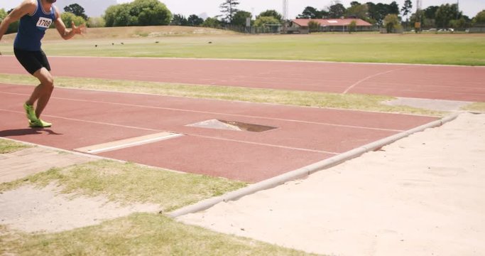Sportsman doing long jump