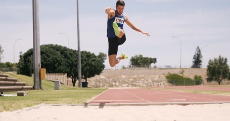 Sportsman doing long jump