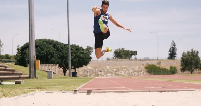 Sportsman doing long jump