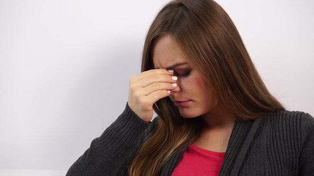 Woman face sad or sinus pressure pain 4K