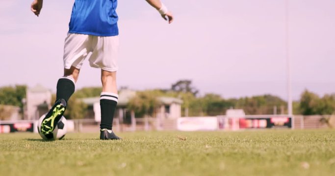 Football player controlling the ball