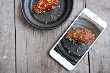 Take photo of korean fried chicken with smart phone