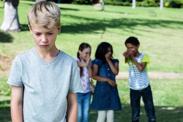 Friends teasing a boy  © WavebreakMediaMicro