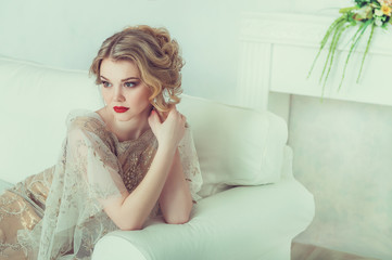 Beautiful bride in wedding dress. Portrait of young bride. Studio shot.
