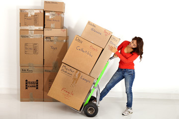 Woman packing and getting ready to move
