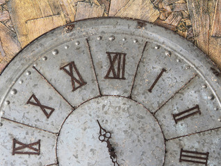 Wall clock old rusty grunge on wooden wall background, (with clipping path)