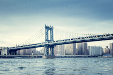 Fototapeta na wymiar Manhattan bridge, Manhattan New York. Urban living and transportation concept. Vintage color post processed