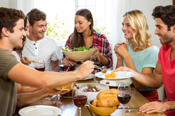 Group of friends having meal