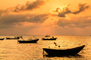 Fishing boats, small boats floating in the sea at sunrise, Conce