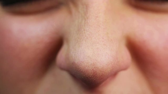 Close-up video of person who wants to sneeze. Allergies, having cold. Healthcare