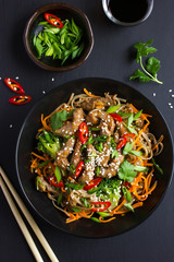 Bowl of soba noodles with beef and vegetables. Asian food.