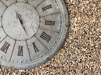 Wall clock old rusty grunge on stone wall background, (with clipping path)