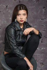 Asian girl wearing a black jacket