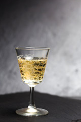 elegant liqueur glass over slate
