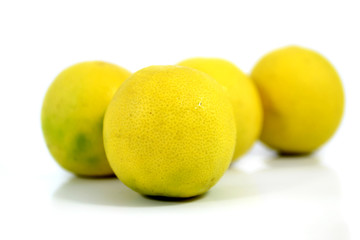 Yellow ripe lime isolated on white background