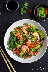 Bowl of soba noodles with beef and vegetables. Asian food.