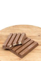 Chocolate bars on the wooden board