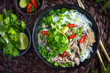 Traditional Vietnamese  soup Pho with beef and rice noodle - obrazy, fototapety, plakaty