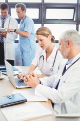 Medical team interacting in conference room