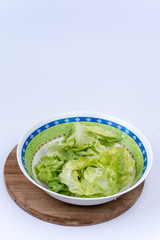 Fresh green lettuce salad in the bowl