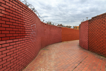 Walled Path With Cloudy Sky