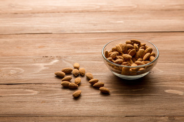 Almonds in a glass Cup on the table